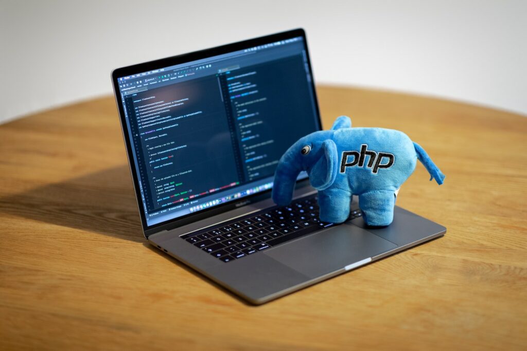 PHP elephant plushie on laptop